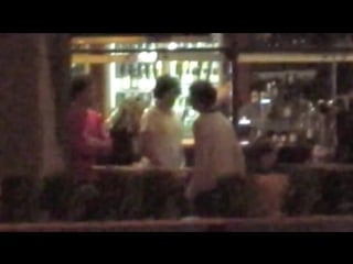 Harry and louis at a bar in wellington (brightened)