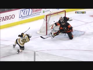 Torey krug finds david pastrnak for one timer with perfect cross ice pass