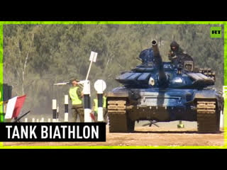 Crews from laos, armenia, syria and myanmar take part in the 'tank biathlon' competition