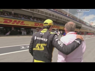 Martin brundle runs for an interview with carlos sainz