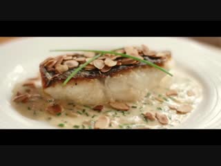 Crispy skin fish almondine with cream sherry sauce and crunchy almonds