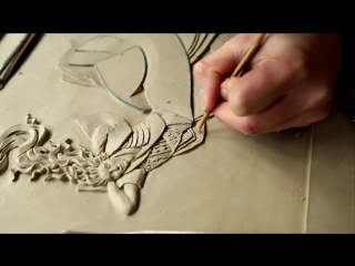 Victoria ellis carves fine bas relief figurative clay mural