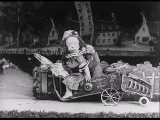 Creepy 1930s stop motion “dolly daisy in hearts and flowers“