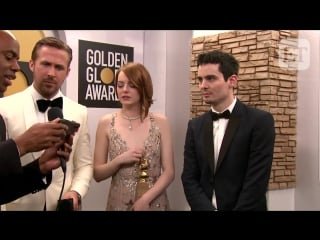 Ryan reynolds and andrew garfields hilarious golden globes kiss emma stone reacts